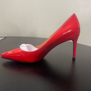 Size 7.5 orange pumps